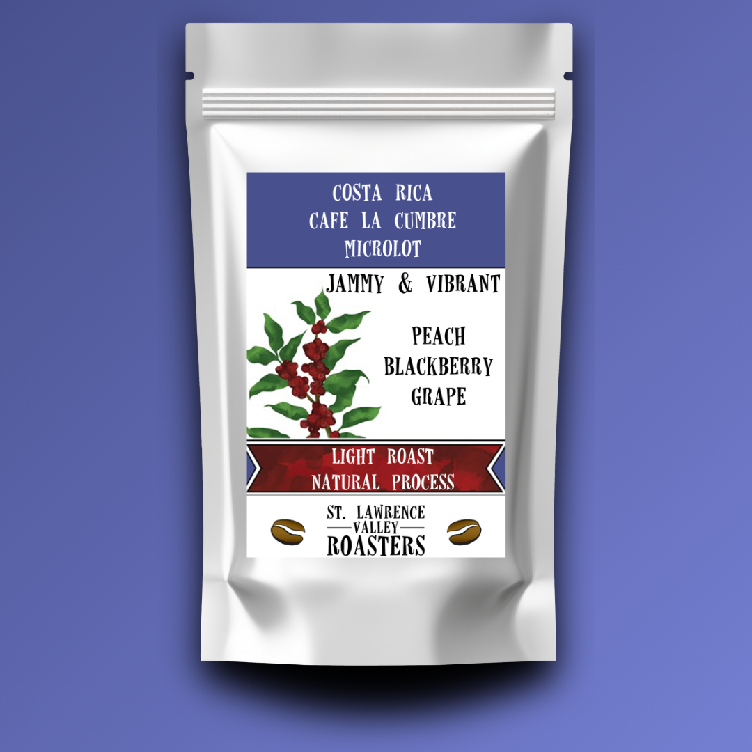 Coffee package with a label featuring coffee cherries on a purple background