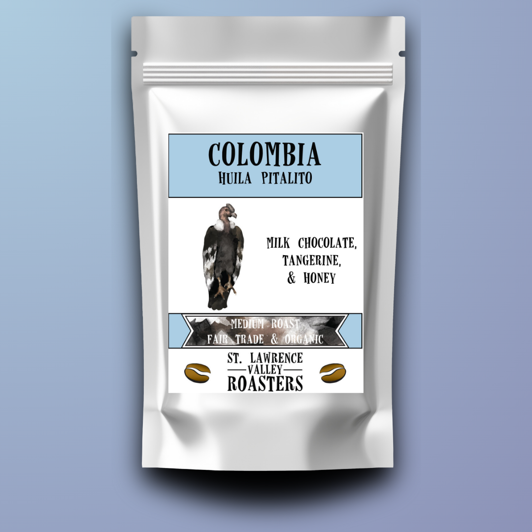 Coffee package with 'colombia huila pitalito' label on a light blue background